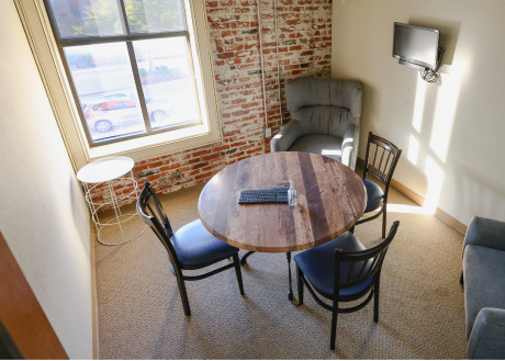 Meeting room with table and chairs Meeting room with table and chairs